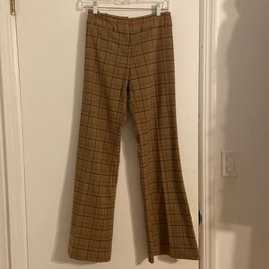 Women’s Hennes Collection bell bottom pants. Tan with pattern. Size 6